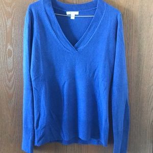 Blue sweater.